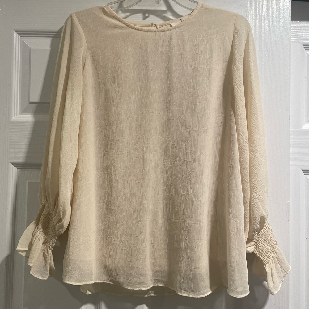 Cream colored blouse